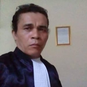 Dr. Manotar Tampubolon, S.H.